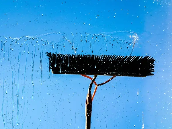 Pure Freedom pole-fed system, showcasing cutting-edge technology for window cleaning at heights up to 70 feet. Experience the brilliance as every window sparkles with cleanliness.